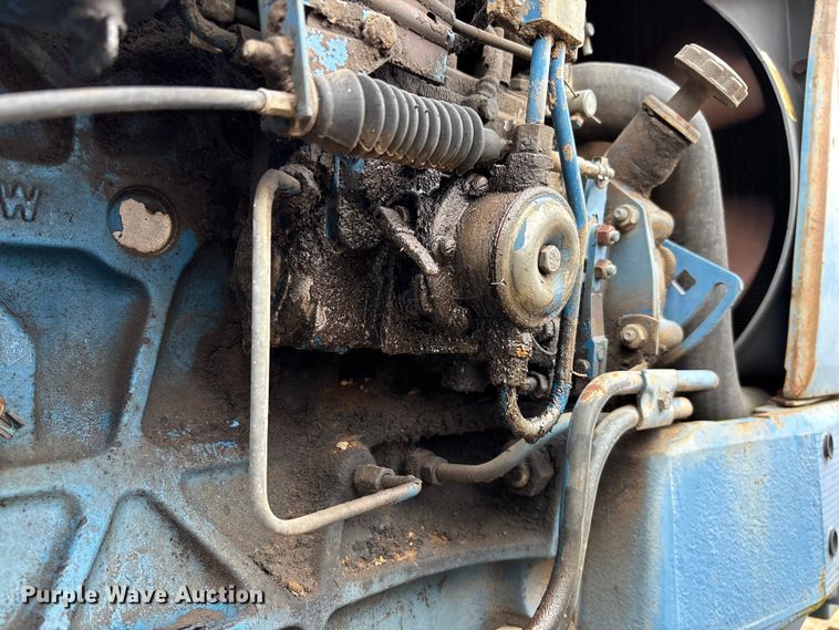 image for item FI1542 Ford 7710 MFWD tractor