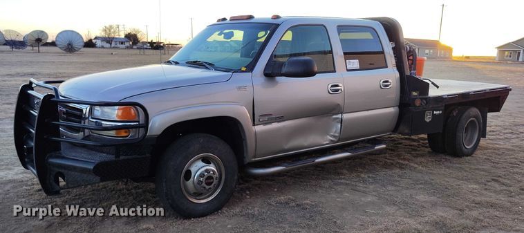 image for item DT0827 2005 GMC Sierra 3500 SLE Crew Cab flatbed pickup truck