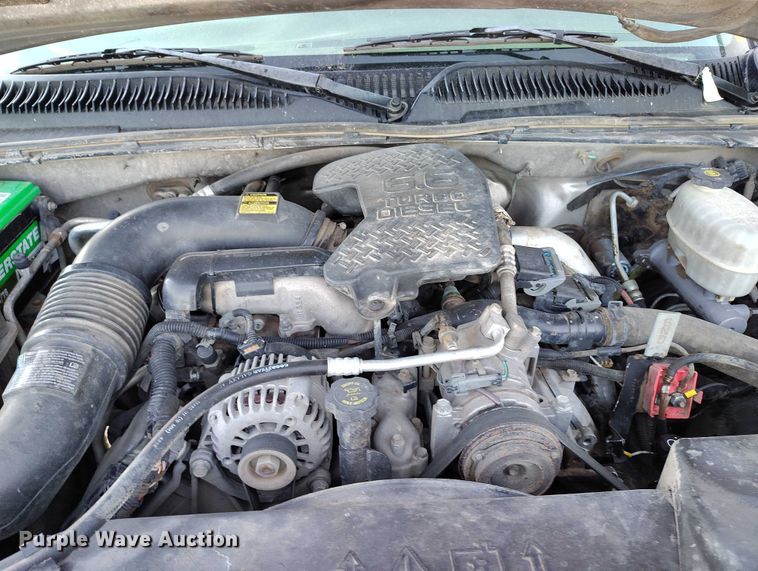 image for item DT0827 2005 GMC Sierra 3500 SLE Crew Cab flatbed pickup truck