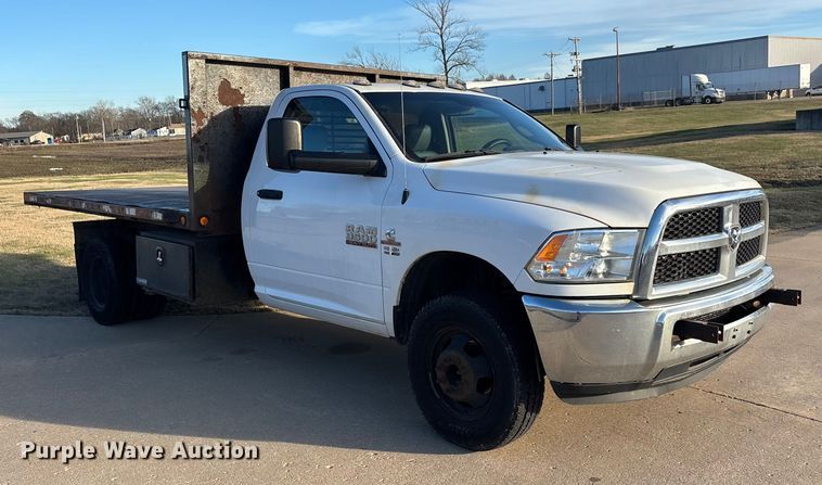 image for item DW7373 2017 RAM 3500 dump flatbed pickup truck