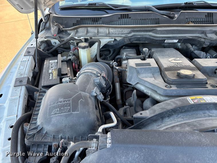 image for item DW7373 2017 RAM 3500 dump flatbed pickup truck