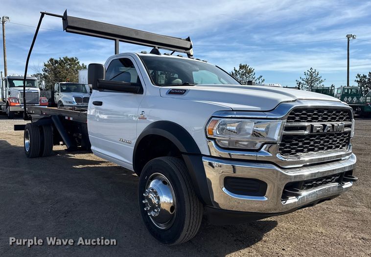 image for item EG1859 2022 RAM 5500 roll-off container truck