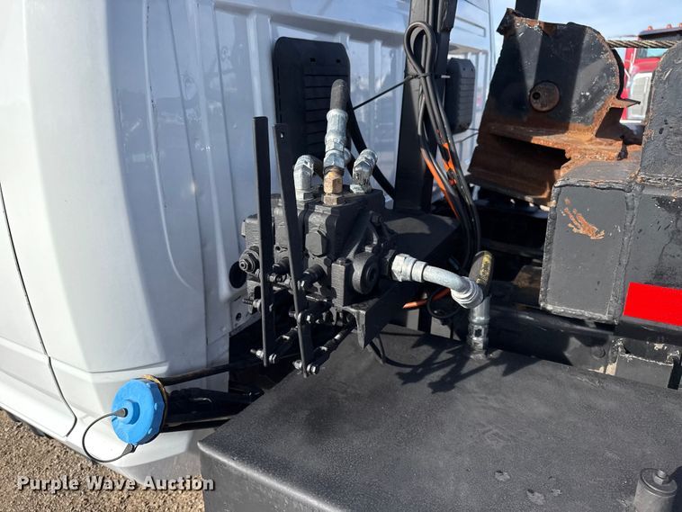 image for item EG1859 2022 RAM 5500 roll-off container truck