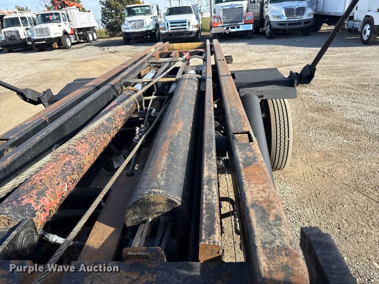 image for item EG1859 2022 RAM 5500 roll-off container truck