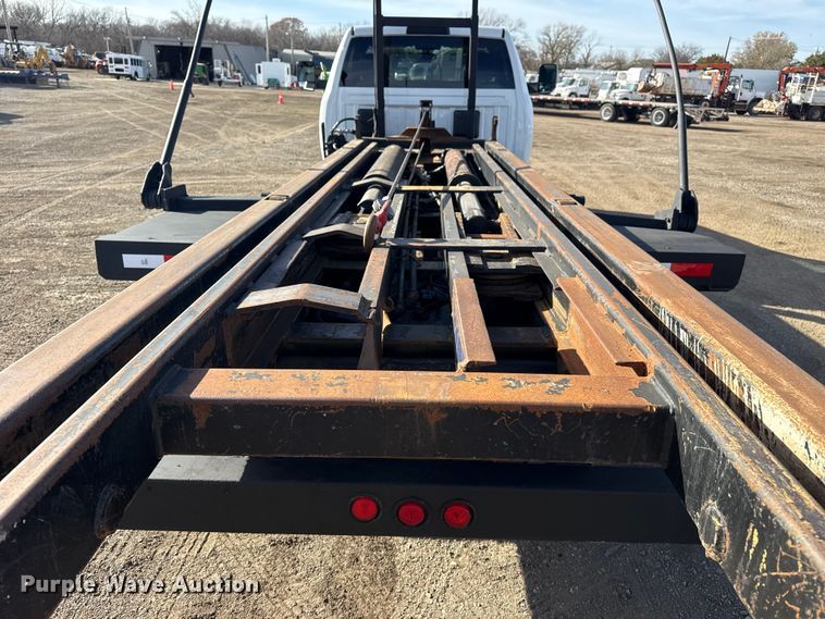 image for item EG1859 2022 RAM 5500 roll-off container truck