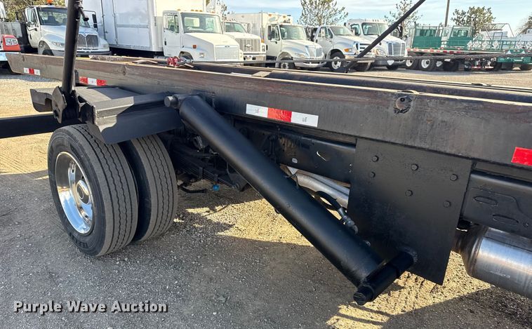 image for item EG1859 2022 RAM 5500 roll-off container truck