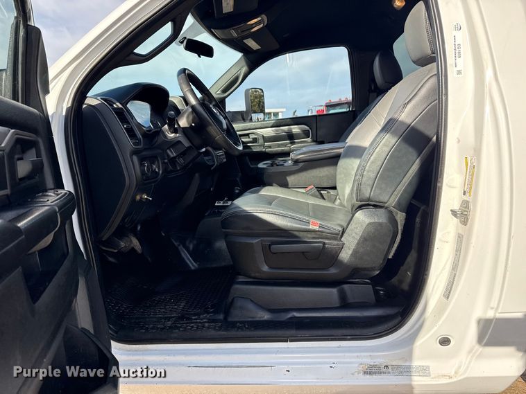 image for item EG1859 2022 RAM 5500 roll-off container truck