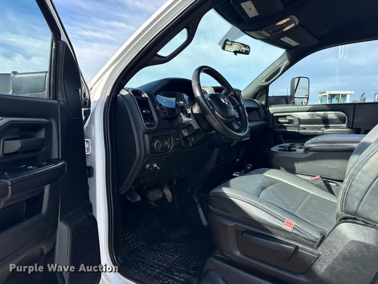 image for item EG1859 2022 RAM 5500 roll-off container truck