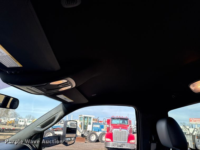 image for item EG1859 2022 RAM 5500 roll-off container truck