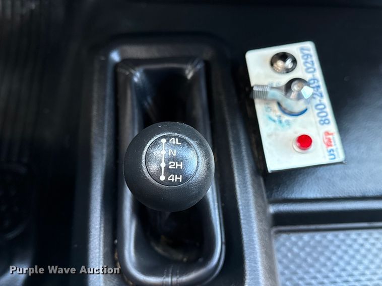 image for item EG1859 2022 RAM 5500 roll-off container truck