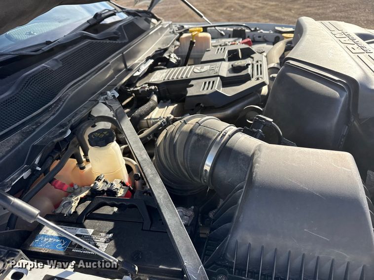 image for item EG1859 2022 RAM 5500 roll-off container truck