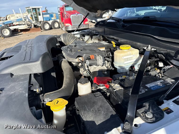 image for item EG1859 2022 RAM 5500 roll-off container truck