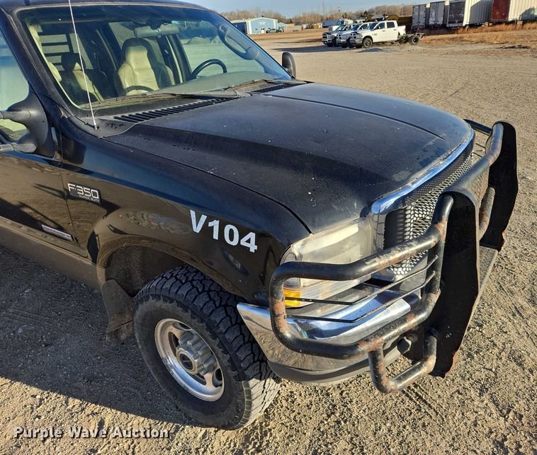 image for item ES2662 2004 Ford F350  Super Duty Crew Cab flatbed truck