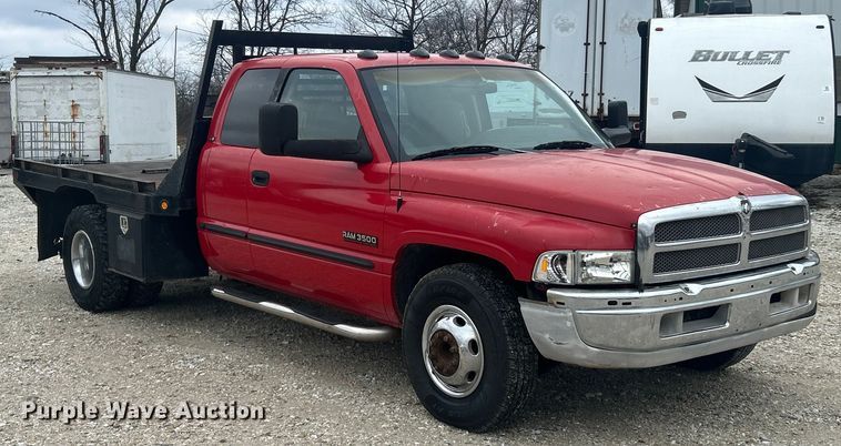 image for item ET6850 2000 Dodge Ram 3500 Ext. Cab flatbed pickup truck