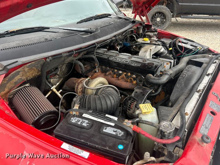 image for item ET6850 2000 Dodge Ram 3500 Ext. Cab flatbed pickup truck