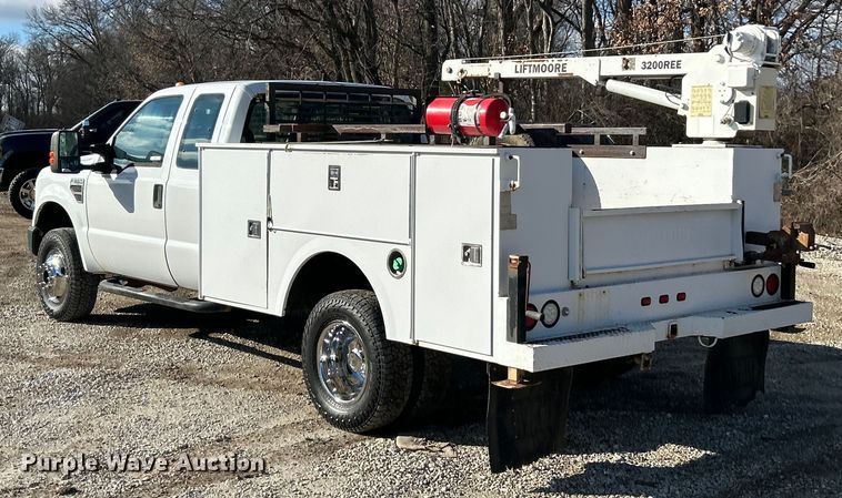 image for item ET6851 2009 Ford  F350 Super Duty  Ext. Cab utility bed pickup truck