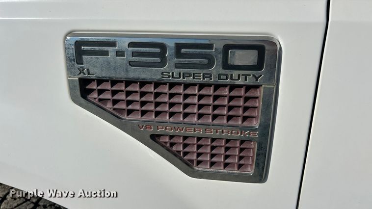 image for item ET6851 2009 Ford  F350 Super Duty  Ext. Cab utility bed pickup truck