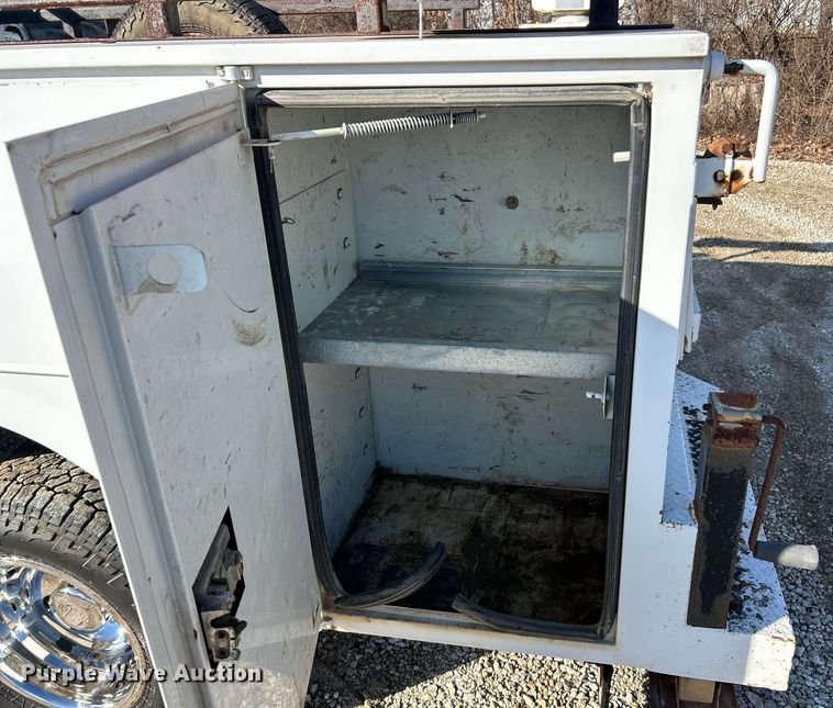 image for item ET6851 2009 Ford  F350 Super Duty  Ext. Cab utility bed pickup truck