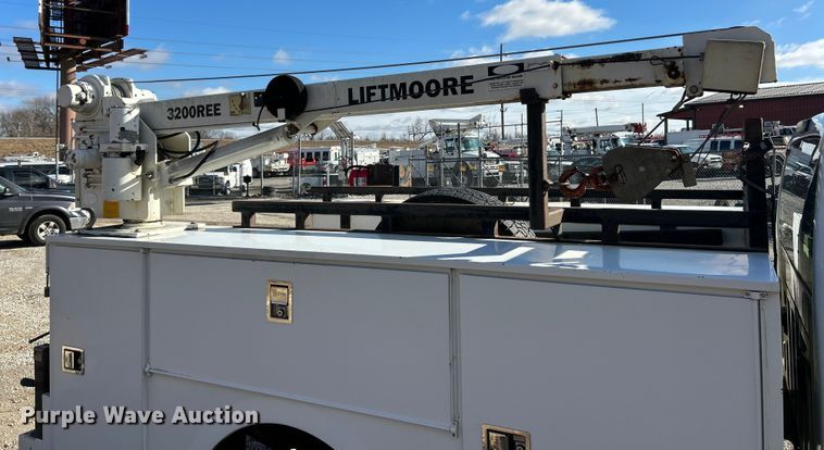 image for item ET6851 2009 Ford  F350 Super Duty  Ext. Cab utility bed pickup truck