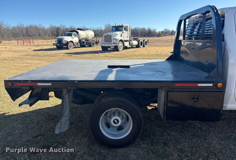 image for item FI0115 2022 Chevrolet Silverado 3500HD Crew Cab flatbed truck