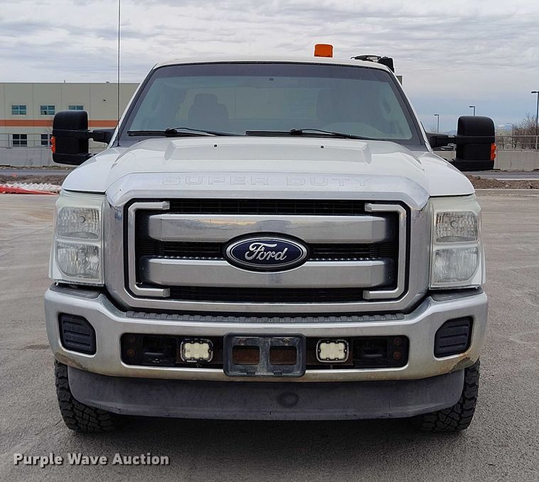 image for item IH9402 2012 Ford F250 Super Duty XLT utility bed pickup truck