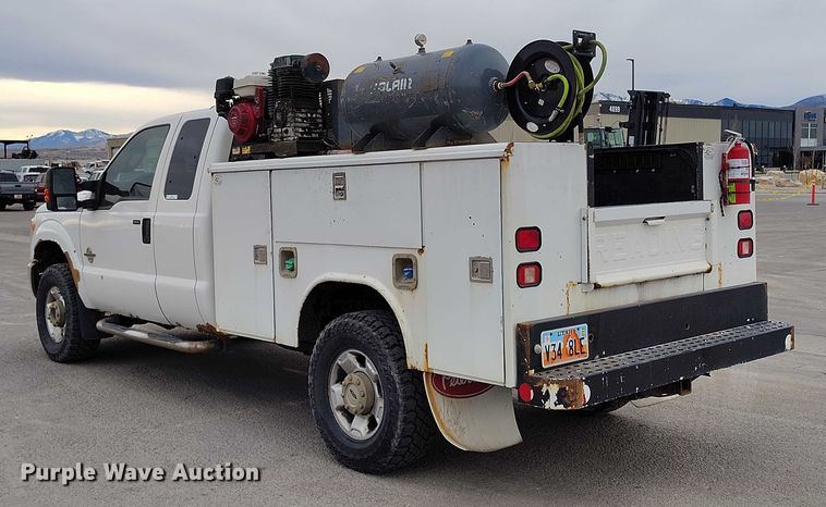 image for item IH9402 2012 Ford F250 Super Duty XLT utility bed pickup truck