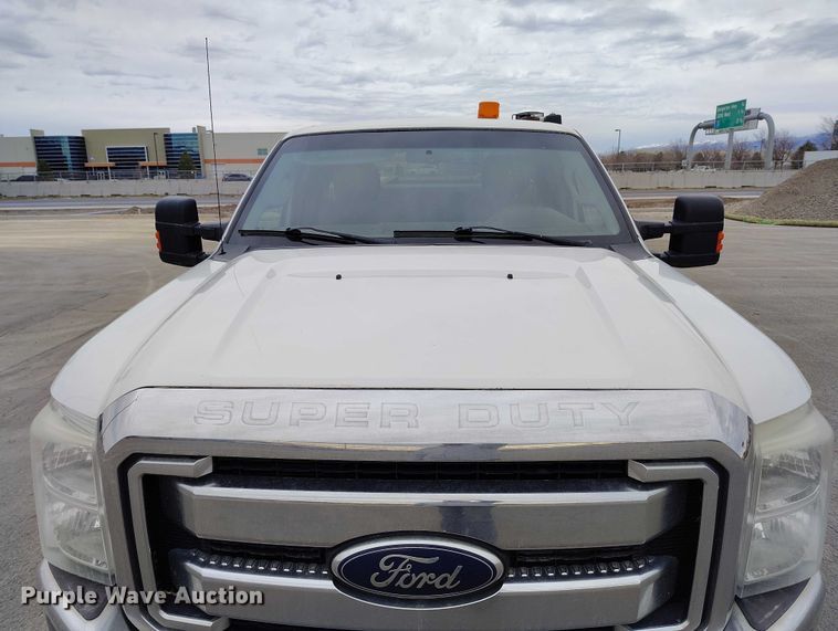 image for item IH9402 2012 Ford F250 Super Duty XLT utility bed pickup truck