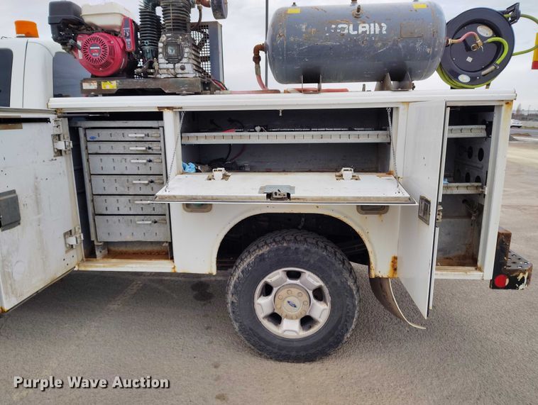 image for item IH9402 2012 Ford F250 Super Duty XLT utility bed pickup truck