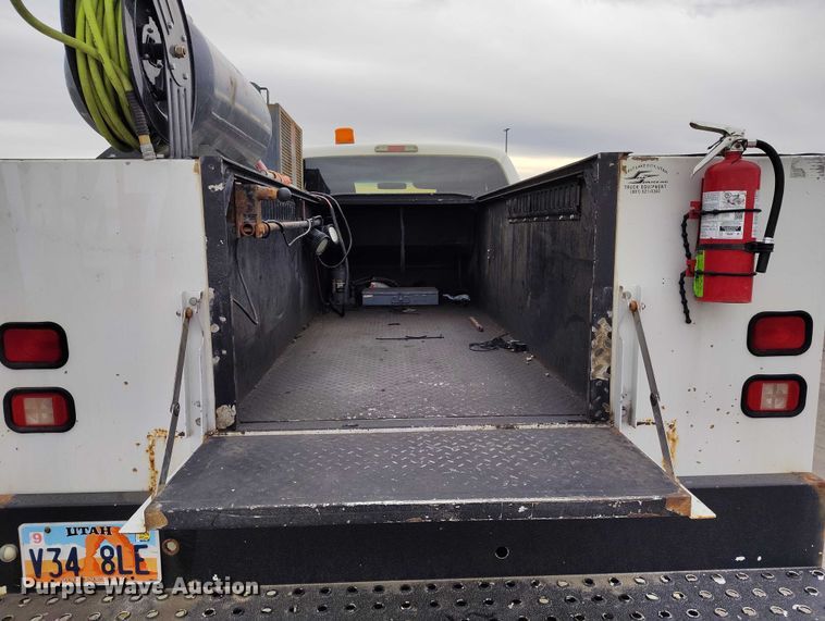 image for item IH9402 2012 Ford F250 Super Duty XLT utility bed pickup truck