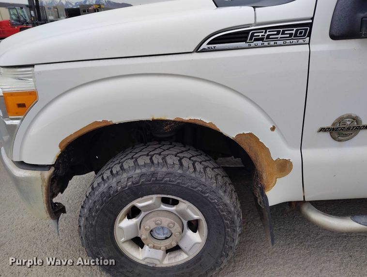 image for item IH9402 2012 Ford F250 Super Duty XLT utility bed pickup truck