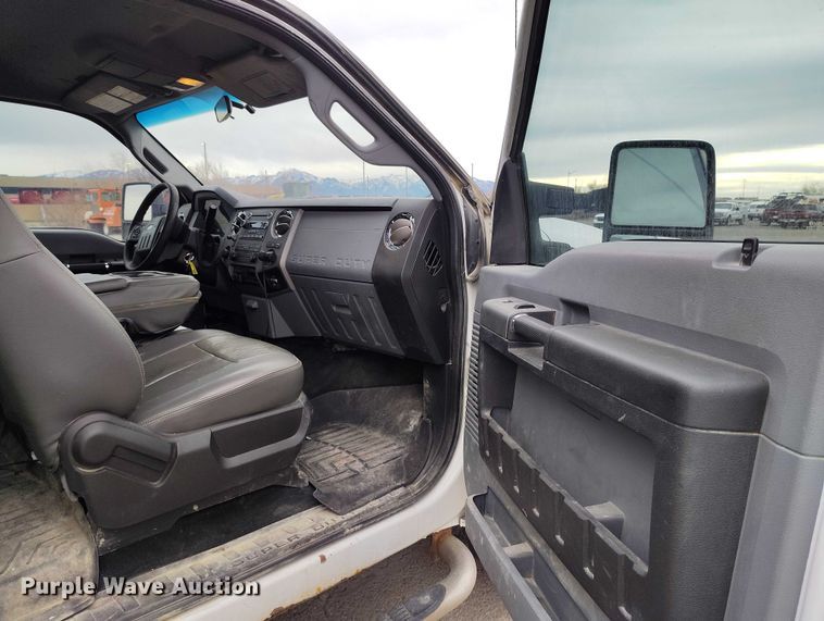 image for item IH9402 2012 Ford F250 Super Duty XLT utility bed pickup truck