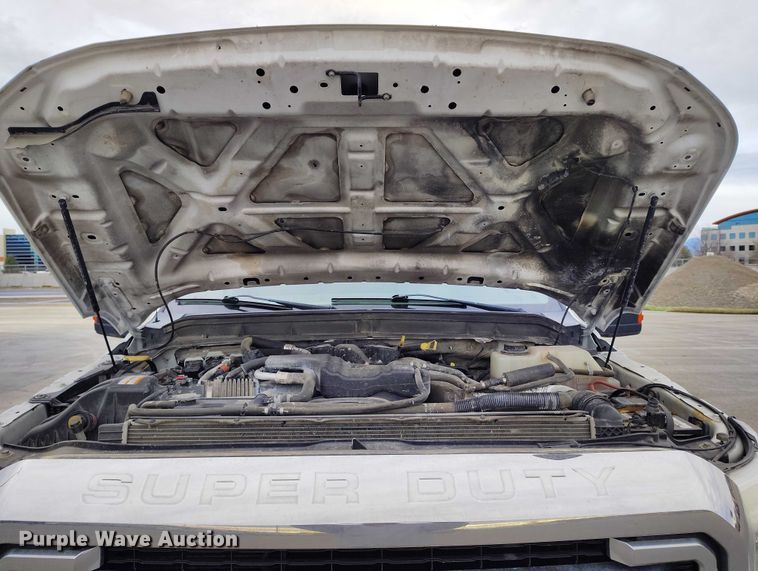 image for item IH9402 2012 Ford F250 Super Duty XLT utility bed pickup truck