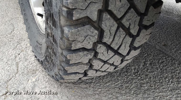 image for item IH9402 2012 Ford F250 Super Duty XLT utility bed pickup truck