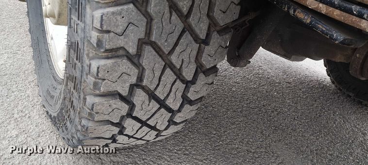 image for item IH9402 2012 Ford F250 Super Duty XLT utility bed pickup truck