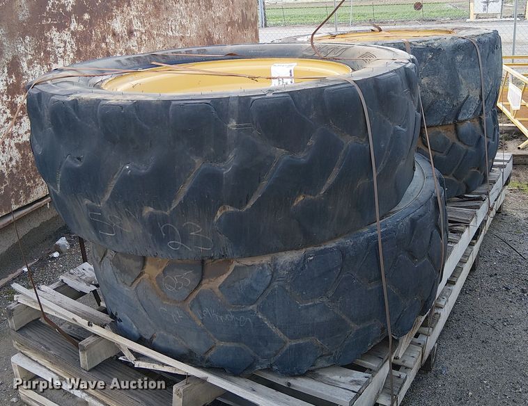 image for item EE4978 (4) 400/75-28 tires and wheels