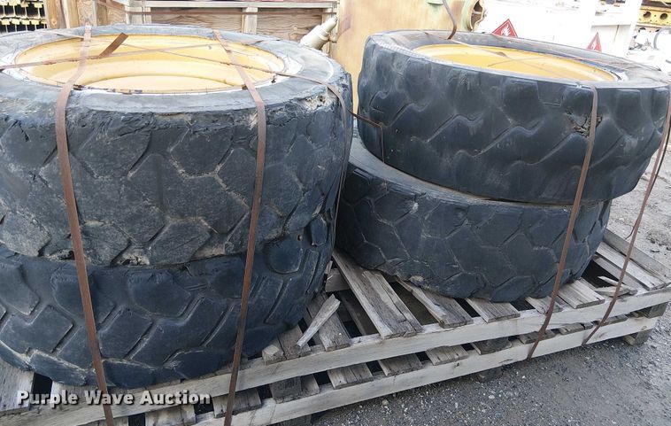 image for item EE4978 (4) 400/75-28 tires and wheels