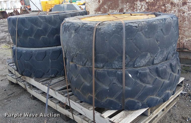 image for item EE4978 (4) 400/75-28 tires and wheels