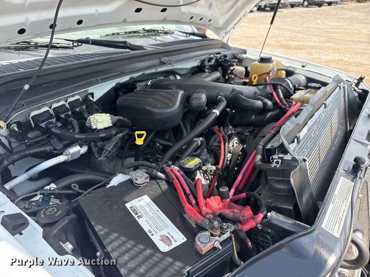 image for item EG6060 2010 Ford F350 Super Duty Ext. Cab utility bed pickup truck