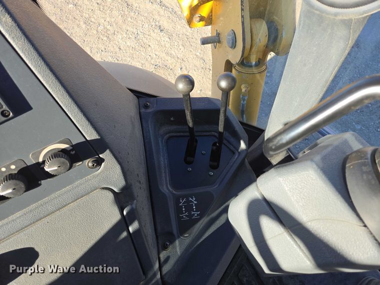 image for item ES2664 2015 John Deere 310SL HL backhoe