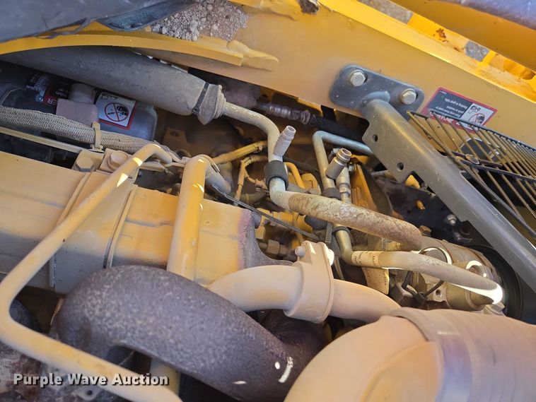 image for item ES2664 2015 John Deere 310SL HL backhoe