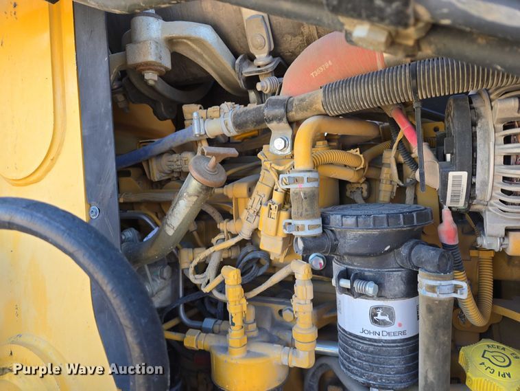 image for item ES2664 2015 John Deere 310SL HL backhoe