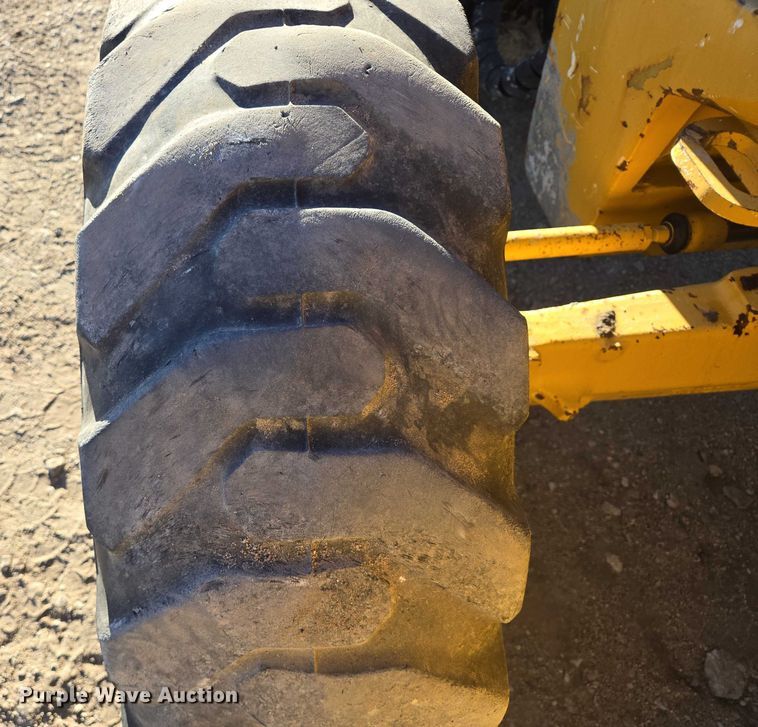 image for item ES2664 2015 John Deere 310SL HL backhoe