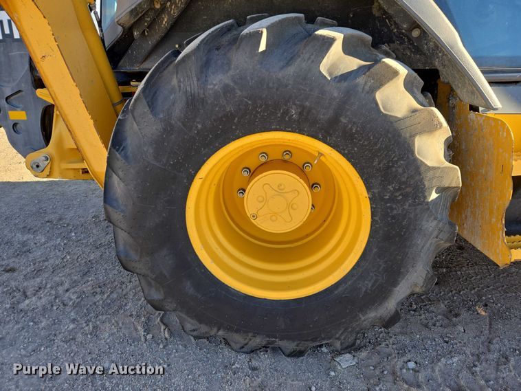 image for item ES2664 2015 John Deere 310SL HL backhoe