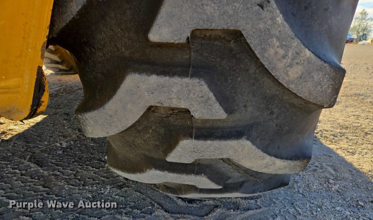 image for item ES2664 2015 John Deere 310SL HL backhoe