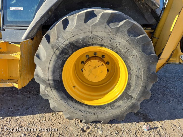 image for item ES2664 2015 John Deere 310SL HL backhoe