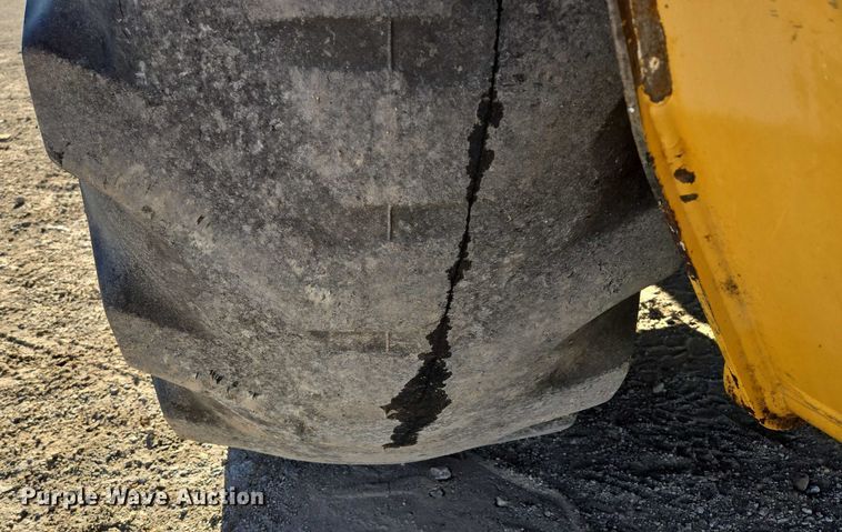 image for item ES2664 2015 John Deere 310SL HL backhoe