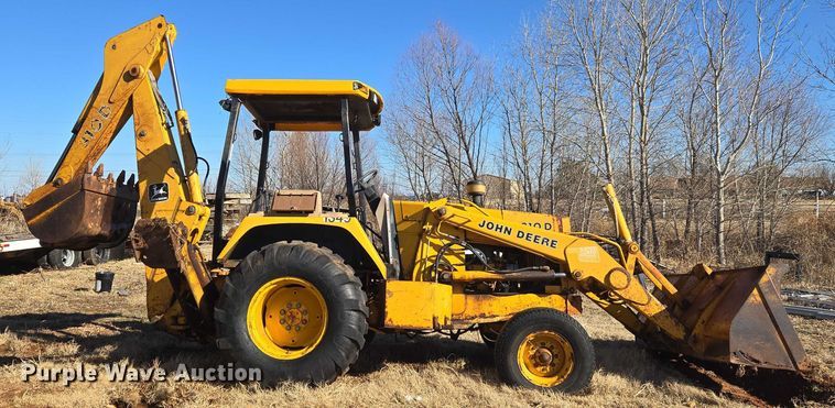 image for item ET1159 1991 John Deere 310D backhoe