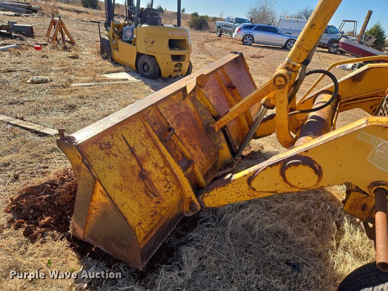image for item ET1159 1991 John Deere 310D backhoe