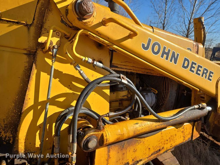 image for item ET1159 1991 John Deere 310D backhoe