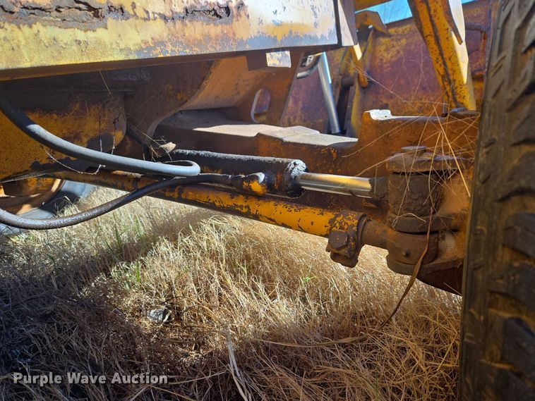 image for item ET1159 1991 John Deere 310D backhoe